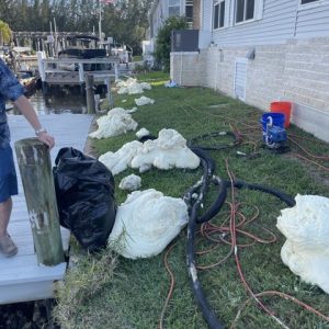 Chemical grouting foam materials laid out on a job site
