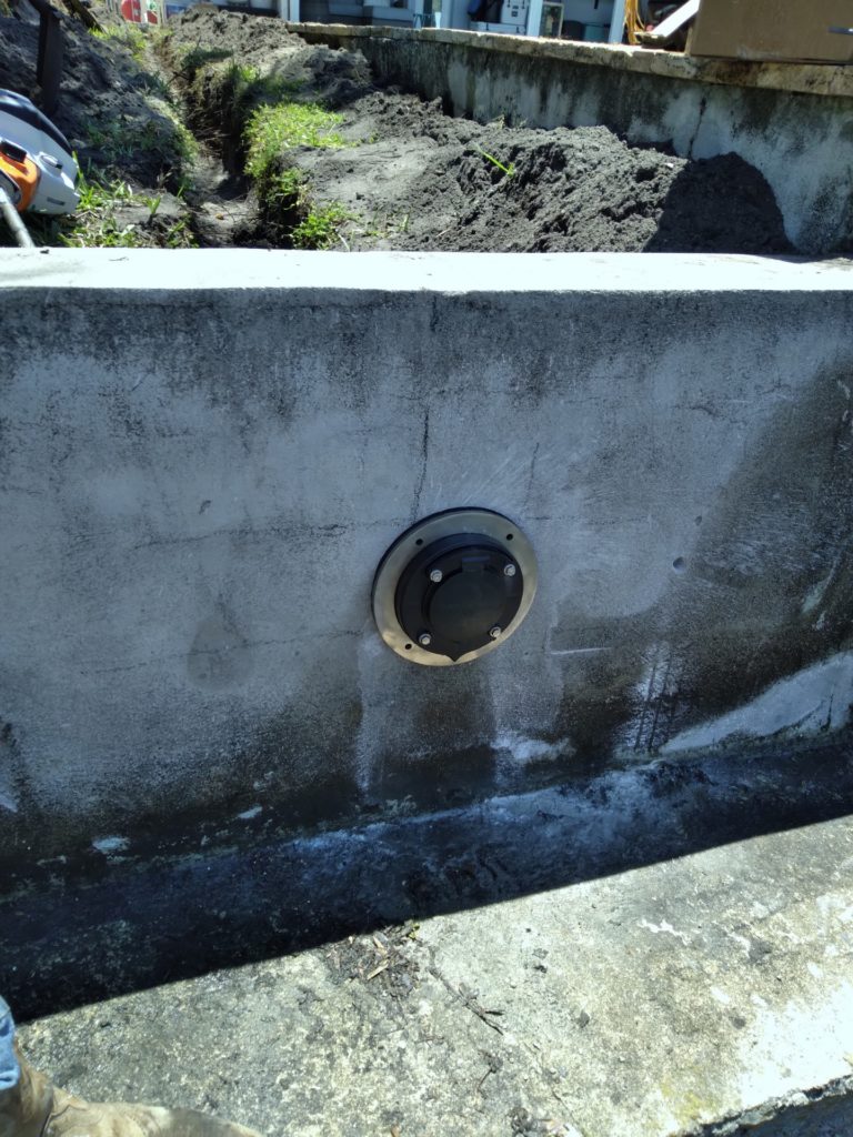 Finished sealed and stabilized seawall after repair