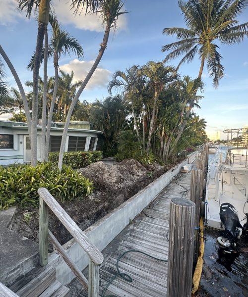 Seawall rebuild project with dock access on Florida waterway